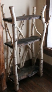 Birch branches and reclaimed barn wood make this shelf eco-friendly as hell.