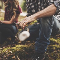 Couple cooking marshmallows